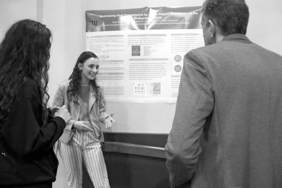 Maya Rosen ’21 speaks to guests at the internship forum about her work studying viral transmission among mosquitoes.