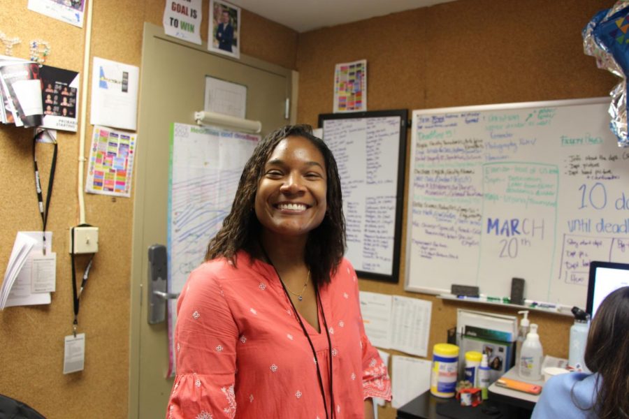 In addition to teaching ninth- and tenth-grade English, Ms. Ellis has guided REs Yearbook staff.
