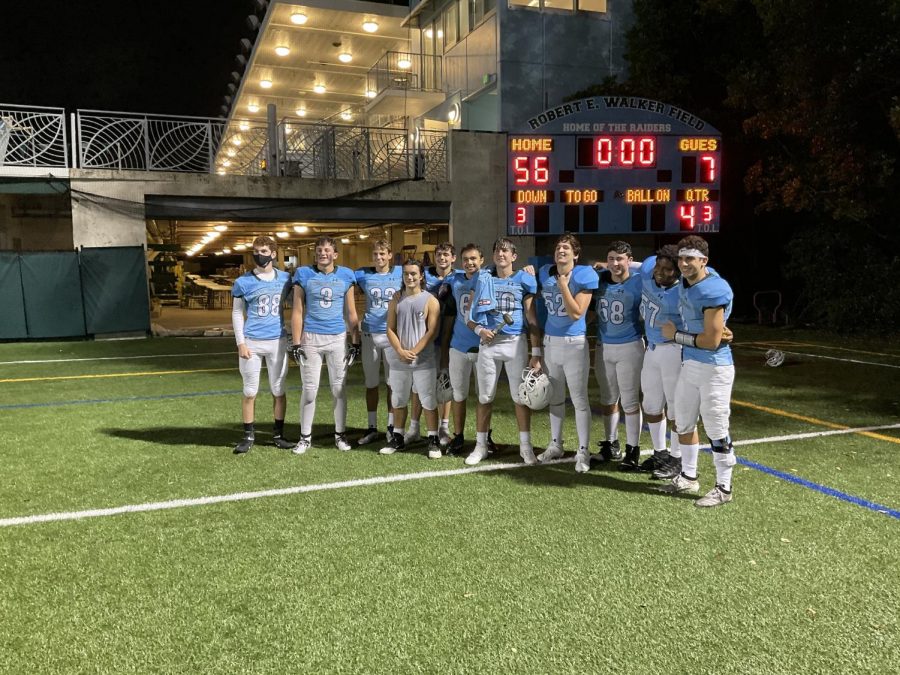 Raiders gather to take one last photo celebrating the 2020 season.