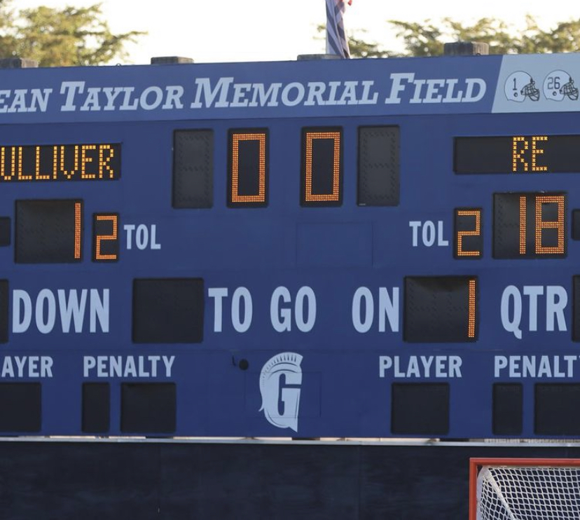 Gulliver scoreboard displays final score of the game at Sean Taylor Memorial Field.