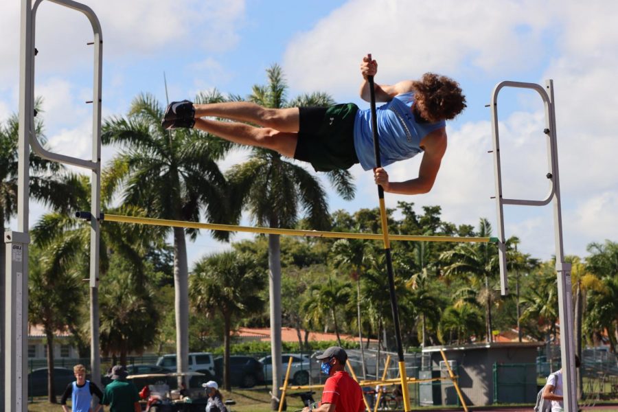 Aidan Rothestein 22 competes in the pole vault competition.