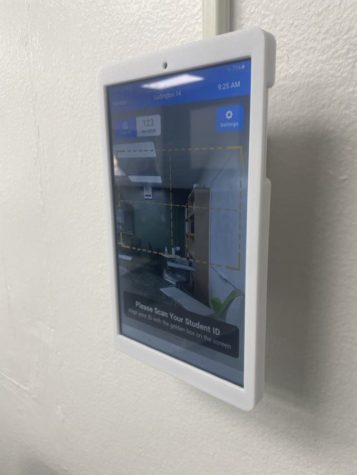 Android tablets now hang by the door of each classroom.