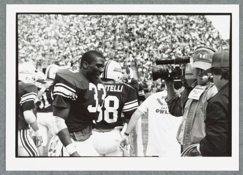Mr. Clark playing football for Dartmouth.