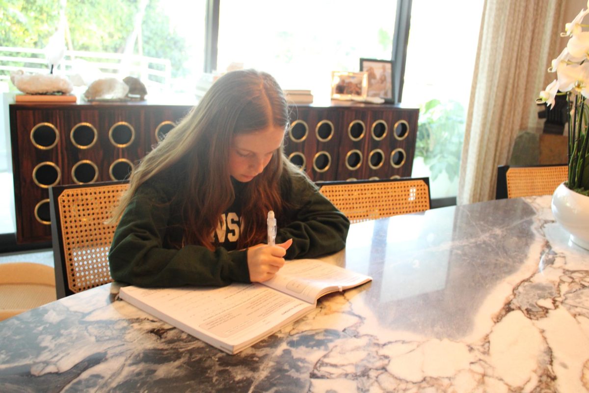 Fifth grader Ella Cooper '32 studies for the math on the SSAT