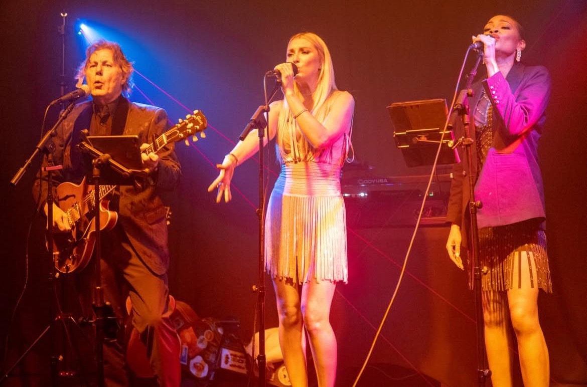 The band Vizcaya performing at a gala